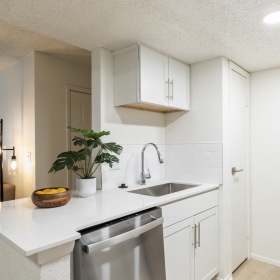 Luxuriously redesigned kitchens featuring bright, open layouts and modern finishes.